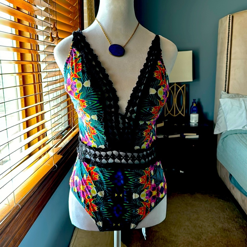 Gorgeous one piece swim costume with adjustable back. Worn once.